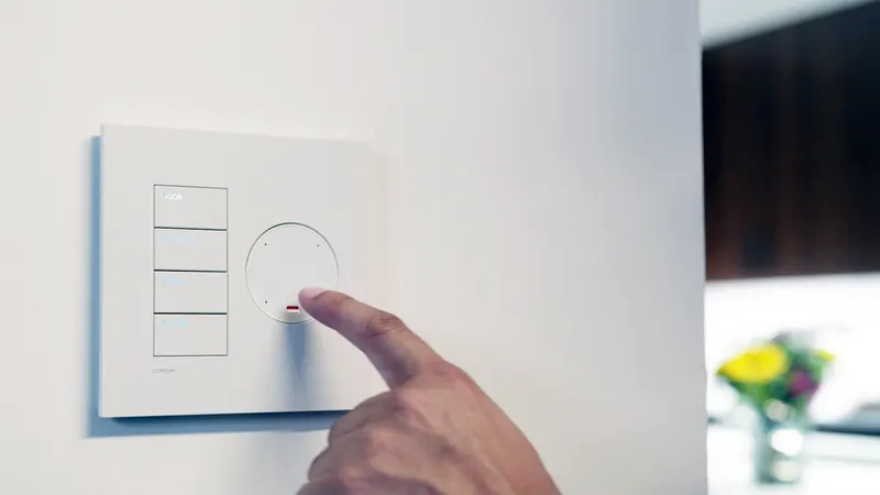 A smart lighting keypad on a wall